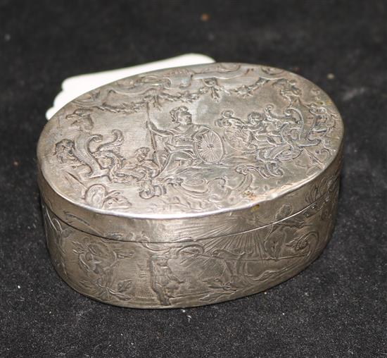 An 18th/19th century Continental white metal oval box decorated with classical scenes centred by Zeus,